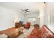 Spacious living room boasting hardwood floors, floral patterned sofa, and classic furnishings at 380 Woodlawn Ave, Cramerton, NC 28032