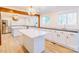 Bright, open kitchen featuring a central island and stainless steel appliances at 3921 Bon Rea Dr, Charlotte, NC 28226