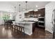 Open concept kitchen features a large island, stainless steel appliances, and a breakfast area at 4013 Hamilton Mill Dr, Waxhaw, NC 28173