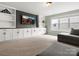 Inviting living room boasts a built-in entertainment center, creating a cozy space for relaxation and entertainment at 4013 Hamilton Mill Dr, Waxhaw, NC 28173