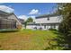 Spacious backyard with patio area, trampoline, and play equipment at 4075 Clover Nw Rd, Concord, NC 28027