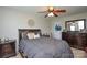 Comfortable bedroom features a queen bed and coordinating dark wood furnishings at 4075 Clover Nw Rd, Concord, NC 28027