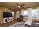 Inviting living room featuring hardwood floors, neutral paint and lots of natural light at 4075 Clover Nw Rd, Concord, NC 28027