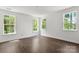 Light-filled bedroom with large windows, creating a bright and airy ambiance at 4315 Palm Dr, Denver, NC 28037