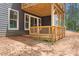 View of a wooden deck with railing, attached to the house at 4315 Palm Dr, Denver, NC 28037
