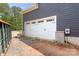 Attached white garage door with black hardware, surrounded by brickwork at 4315 Palm Dr, Denver, NC 28037