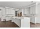 New kitchen boasting white cabinets, a large island, and modern finishes at 4315 Palm Dr, Denver, NC 28037