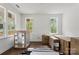 Bright, unfinished room with beautiful hardwood floors and large windows at 4315 Palm Dr, Denver, NC 28037