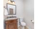 Stylish half bathroom with granite countertop and modern fixtures at 4409 Winder Trl, Gastonia, NC 28056