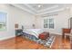 Spacious bedroom with tray ceiling and hardwood floors at 4409 Winder Trl, Gastonia, NC 28056