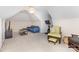 Bright bonus room with plush carpeting, ample natural light, and comfortable seating area at 4409 Winder Trl, Gastonia, NC 28056