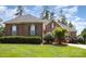 Attractive brick home with well-maintained lawn and shrubbery, offering a cozy and inviting curb appeal at 4409 Winder Trl, Gastonia, NC 28056