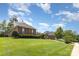 Well-maintained home with lush front lawn and neatly trimmed landscaping at 4409 Winder Trl, Gastonia, NC 28056