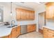 Well-lit kitchen featuring stainless steel appliances and light-colored cabinetry at 4409 Winder Trl, Gastonia, NC 28056