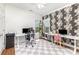 Bright home office with two desks and decorative wallpaper at 4409 Winder Trl, Gastonia, NC 28056