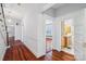 A bright hallway connects several rooms, with views to the bathroom and living room at 448 Union S St, Concord, NC 28025