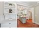 Open kitchen layout with modern appliances and a central island for dining at 448 Union S St, Concord, NC 28025