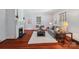 Bright living room featuring hardwood floors, a fireplace, neutral walls, and stylish furniture at 448 Union S St, Concord, NC 28025