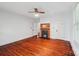 Cozy living room with hardwood floors and an elegant fireplace with a natural wood mantle at 448 Union S St, Concord, NC 28025