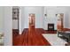 Elegant living room with hardwood floors, a fireplace, and classic architectural details, offering a sophisticated living space at 448 Union S St, Concord, NC 28025