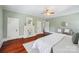 Bright main bedroom features a decorative fireplace, hardwood floors, and neutral-toned walls at 448 Union S St, Concord, NC 28025