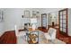 Cozy home office with fireplace, wood floors, and ample natural light at 448 Union S St, Concord, NC 28025
