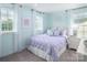 Charming bedroom with pastel walls, a plush bed, and sheer curtains allowing for soft, natural light to fill the room at 490 Lenswood Ct, Denver, NC 28037