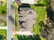Aerial view of home showing roof, landscaping, driveway, and surrounding neighborhood at 5004 Woodview Ln, Matthews, NC 28104