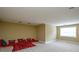 Bonus room with a cozy seating area and natural light at 5004 Woodview Ln, Matthews, NC 28104