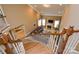 High-angle view of a living room featuring a fireplace, sofa, and stairs at 5004 Woodview Ln, Matthews, NC 28104