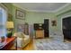 Relaxing living room with comfortable seating, hardwood floors, and natural light at 504 S Hayne St, Monroe, NC 28112