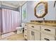 Clean bathroom with granite vanity top, tile flooring, and natural light; a clean, stylish and practical space at 5163 Meadow Park Ln, Hickory, NC 28602
