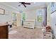 Welcoming Bedroom with soft carpet flooring, natural light, and calming tones at 5163 Meadow Park Ln, Hickory, NC 28602