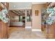 Elegant foyer view into the spacious living room, highlighting the hardwood floors and coffered ceiling at 5163 Meadow Park Ln, Hickory, NC 28602