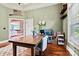 Cozy office features hardwood floors, neutral walls, and a decorative shelving at 5163 Meadow Park Ln, Hickory, NC 28602