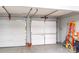 Spacious three car garage with ample storage space and easy access for vehicles and tools at 5227 Eagle Creek Dr, Charlotte, NC 28269