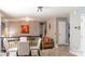 Open-concept living and dining area with stylish decor, hardwood floors, and ample space for entertaining at 5227 Eagle Creek Dr, Charlotte, NC 28269