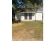 White storage shed with a double-door entry, offering practical and secure space for belongings at 524 Railroad Nw Dr, Concord, NC 28025