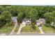 Aerial view of neighborhood featuring landscaped lawns and mature trees at 5625 Linda Vista Ln, Charlotte, NC 28216