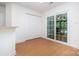Open floor plan shows an eat in kitchen with sliding doors and stainless steel appliances at 5625 Linda Vista Ln, Charlotte, NC 28216