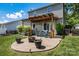 Backyard area with a patio, hot tub, and outdoor seating at 6107 Raisin Tree Ln, Charlotte, NC 28215