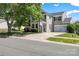 Two-story home with an attached two-car garage, featuring well-maintained landscaping and a paved driveway at 6107 Raisin Tree Ln, Charlotte, NC 28215