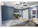 Cozy living room featuring a TV, ceiling fan, and neutral carpet at 6107 Raisin Tree Ln, Charlotte, NC 28215