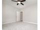 Neutral bedroom with carpet floors, ceiling fan, and a doorway, providing a blank canvas for personalization at 6201 New Hope Church Rd, Marshville, NC 28103