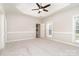 Large main bedroom with tray ceiling, carpet, and natural light at 6201 New Hope Church Rd, Marshville, NC 28103