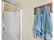 Bathroom boasts a glass enclosed shower and blue towels hanging on a rack at 641 Saratoga Dr, Clover, SC 29710