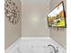 Relaxing bathroom with a jet tub and mounted television at 641 Saratoga Dr, Clover, SC 29710
