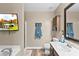 Bathroom features a vanity, shower, and wall-mounted storage at 641 Saratoga Dr, Clover, SC 29710