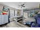 Bedroom with a bunk bed, a twin bed, wood-look flooring, and lots of natural light at 641 Saratoga Dr, Clover, SC 29710