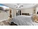 Bright bedroom boasts a television, ceiling fan, walk-in closet and en-suite bathroom at 641 Saratoga Dr, Clover, SC 29710
